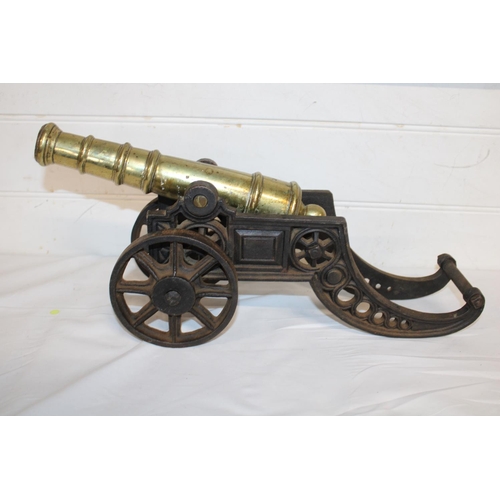 2 - A heavy brass canon with cast iron carriage L50cm, shipping unavailable