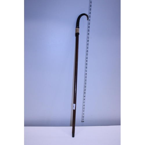 38 - A vintage horn handled walking stick Shipping unavailable