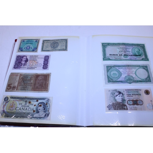 29 - An album containing Old British Coins & British and world bank notes