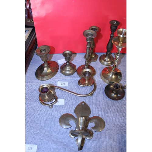 181 - A selection of assorted brass candle sticks etc