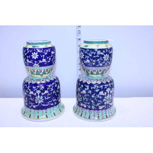 174 - A pair of Chinese bell shaped porcelain vases, finely decorated with scrolling design