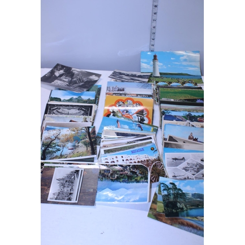 173 - A job lot of assorted postcards