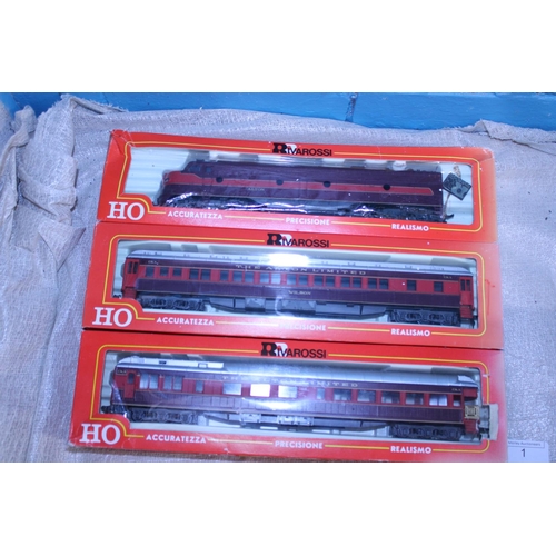 1 - A Rivarossi HO gauge locomotive and two carriages