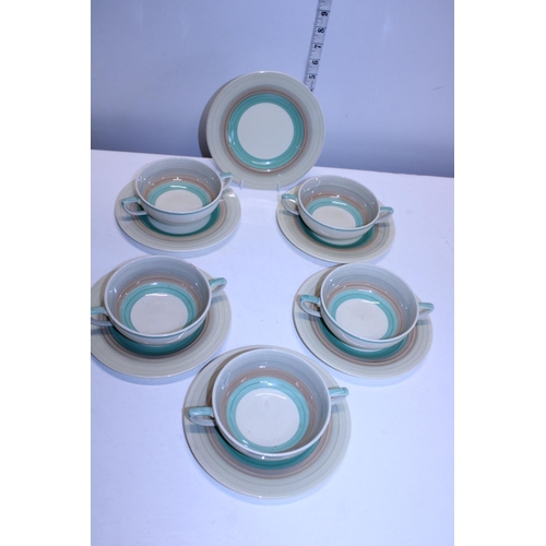 355 - A selection of Susie Cooper 'Wedding Band' Soup bowls and saucers