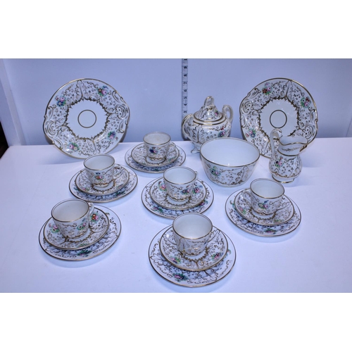 359 - A pretty Victorian bone china tea service with gilt and flower decoration