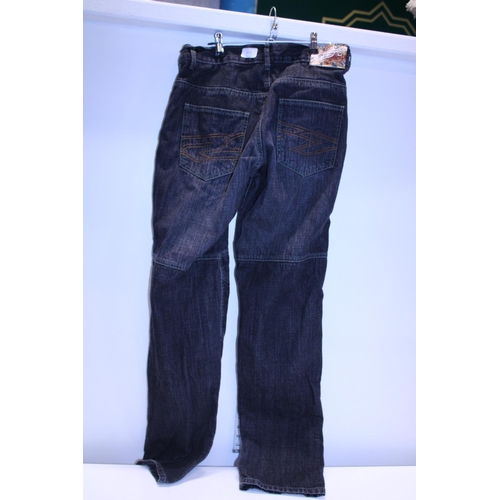 373 - A pair of RST oversized  jeans W32 with pads