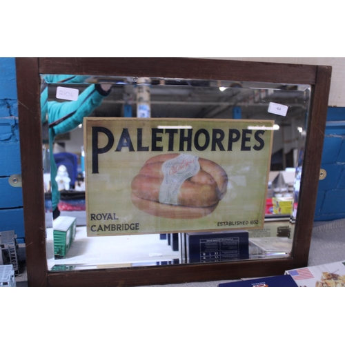 44 - A vintage advertising mirror, shipping unavailable