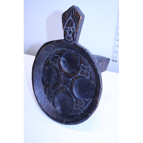 303 - A antique carved tray in the form of a turtle