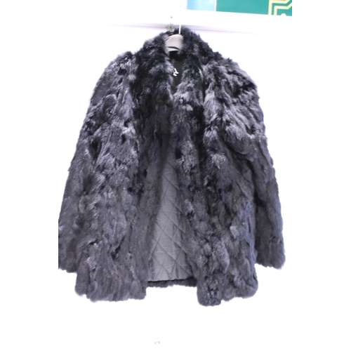 389 - A ladies fur coat