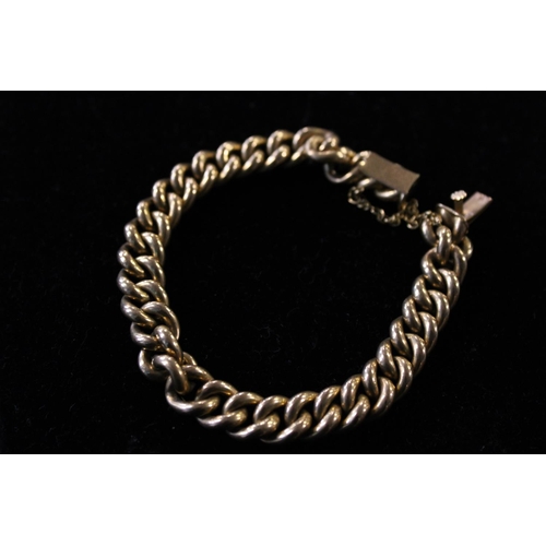 241 - A stamped 18 and tests for 18ct gold rope link bracelet 18.61g