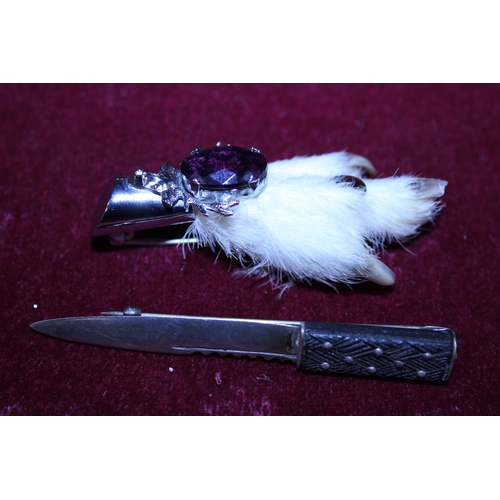 256 - A Scottish themed grouse foot brooch and a hallmarked Scottish silver sgian dubh style brooch