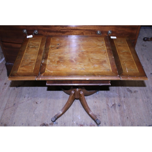 61 - A reproduction regency style occasional table, shipping unavailable