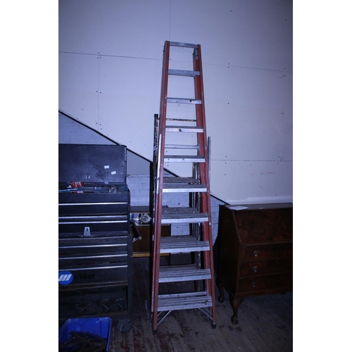 63 - Two metal step ladders. shipping unavailable