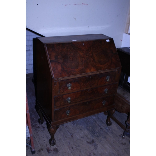 64 - A vintage Walnut veneered writing bureau, shipping unavailable