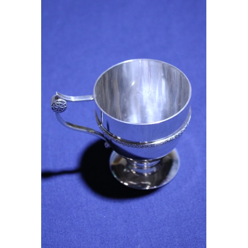 97 - A silver plated Celtic design cup marked L&co (possibly Liberty's & Co?)