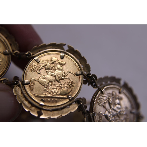 112 - A 9ct gold bracelet with six mounted full 22ct gold sovereigns overall weight 71.71g, approx 48g of ... 