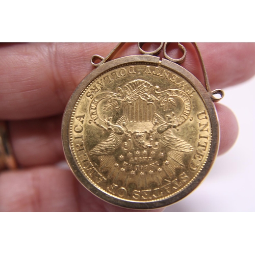 113 - A 1904 American 22ct gold twenty dollar coin in with double eagle and liberty head set in a 9ct gold... 