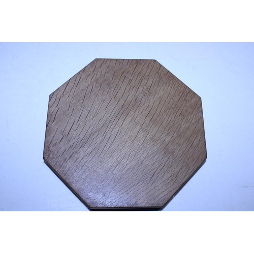 115 - A Robert Thompson of Killburn carved oak 'Mouseman' cheeseboard of octagonal form d20cm (slight impe... 