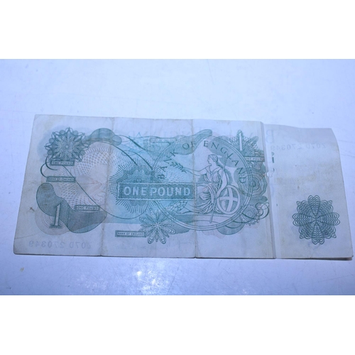 116 - A vintage £1 note with print error and a ten shilling bank note