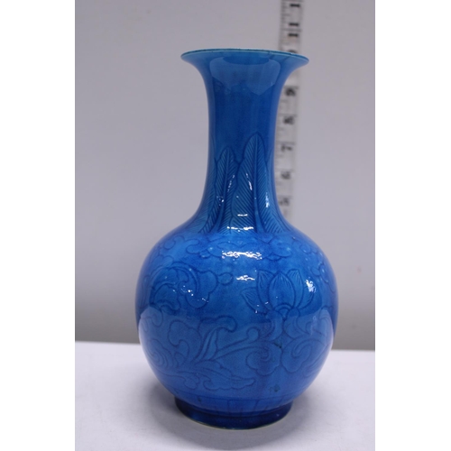 80 - A well potted Chinese turquoise vase with incised decoration h23cm