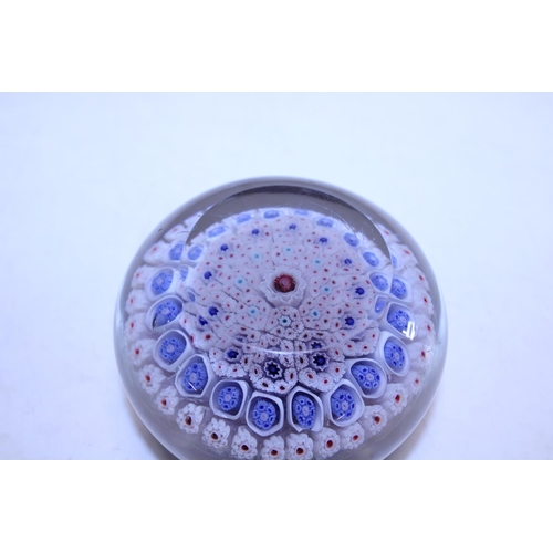 190 - A circa 1850 Bacchus paperweight with millefiori decoration, blue canes with a central red cane and ... 