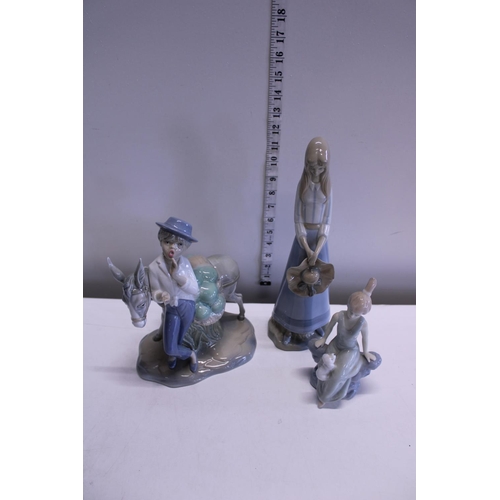 11 - Three Spanish porcelain figures