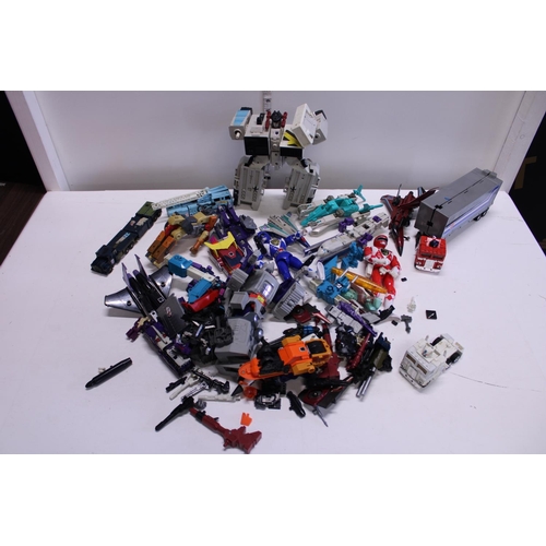 141 - A job lot of assorted transformer models and other items