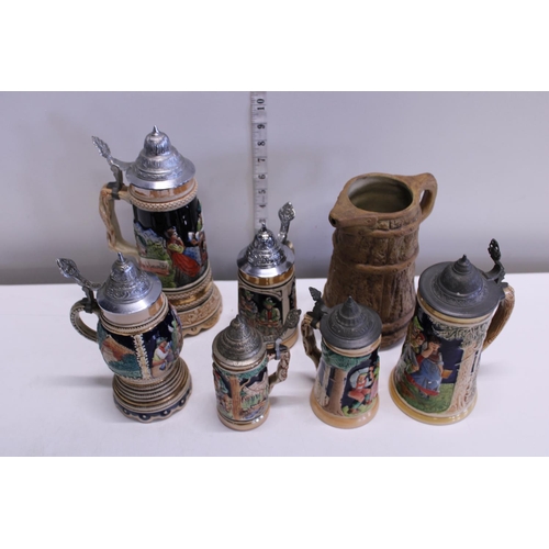 18 - A job lot of vintage German steins etc