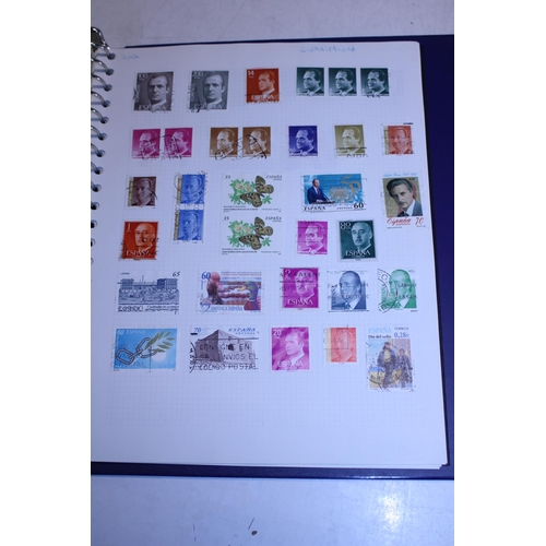 254 - A selection of stamp albums and loose stamps