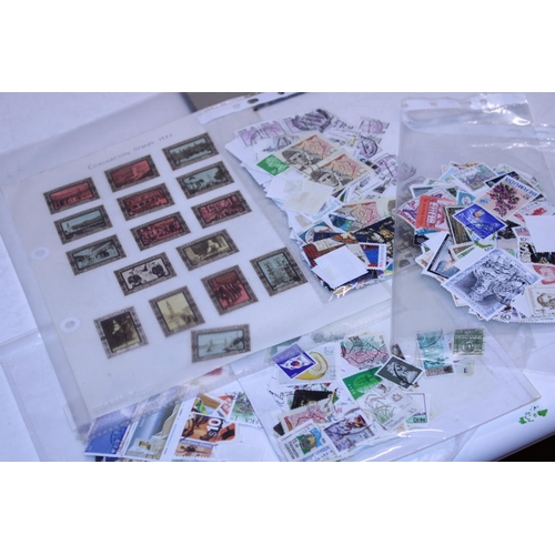 254 - A selection of stamp albums and loose stamps