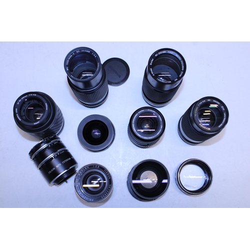 314 - A selection of assorted camera lenses including Yashica etc