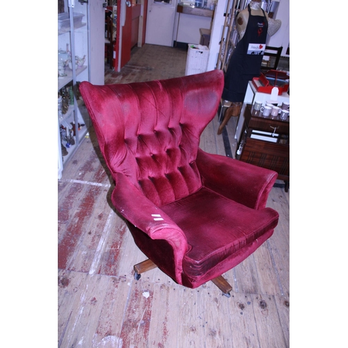 68 - A vintage red velvet wing back swivel chair (possibly G Plan Sixty Two), a/f shipping unavailable