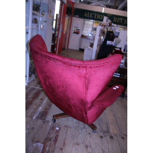 68 - A vintage red velvet wing back swivel chair (possibly G Plan Sixty Two), a/f shipping unavailable