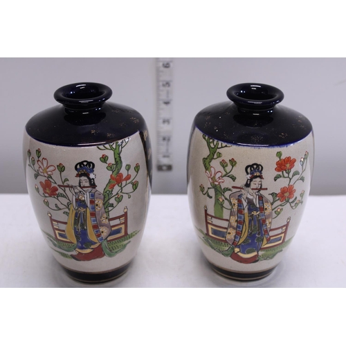 62 - A pair of Japanese vases signed to the base