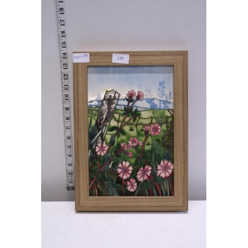 118 - A framed Moorcroft trial wall plaque with original receipt, frame size 26.5x37cm