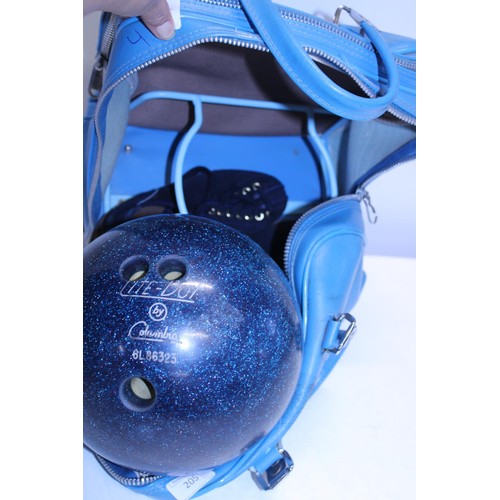 243 - A bowling bag complete with bowling ball and shoes in bag