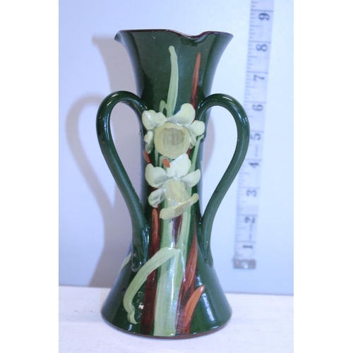 227 - A antique art pottery three handled vessel stamped 3K2 to the base H20cm (very slight chip to rim)