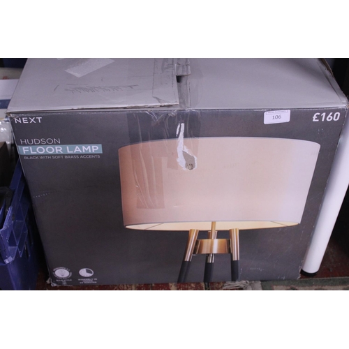 106 - A new boxed Next floor lamp (unchecked)