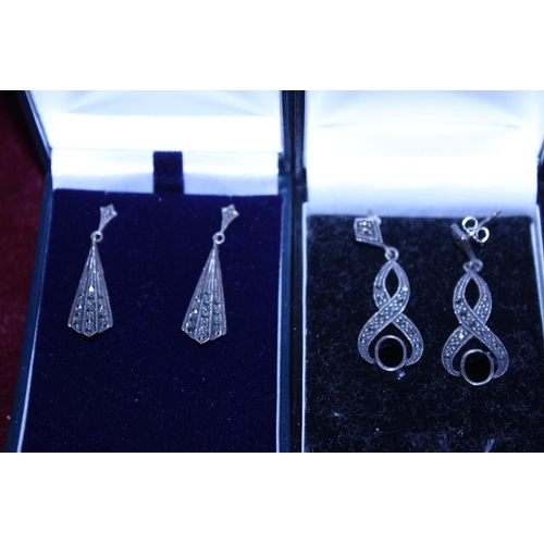 252 - Two pairs of vintage silver and marcasite earrings
