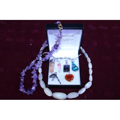 277 - A selection of costume jewellery with semi- precious stones including crystals