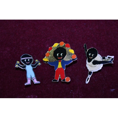 279 - Three vintage Robertson's pin badges