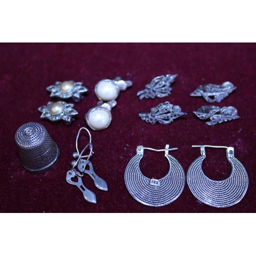 294 - A selection of white metal and silver earrings etc