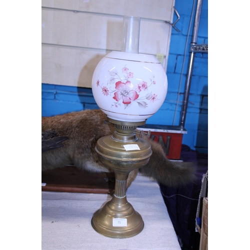 75 - A vintage brass and glass oil lamp. Shipping unavailable