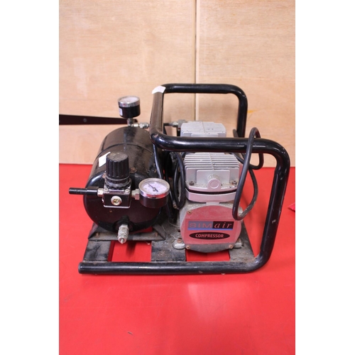 96 - A small working 240v compressor. Shipping unavailable