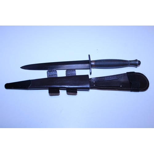 284 - A Fairbairn Sykes pattern 3 commando fighting knife, No 3 to pommel (WW2 issue) and scabbard