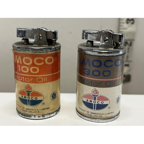 227 - Two vintage novelty AMOCO 100 motor oil table lighters