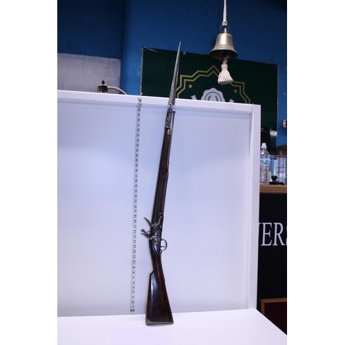 104 - An antique brown Bess flintlock musket with proof marks for Birmingham approx 1850 and earlier with ... 