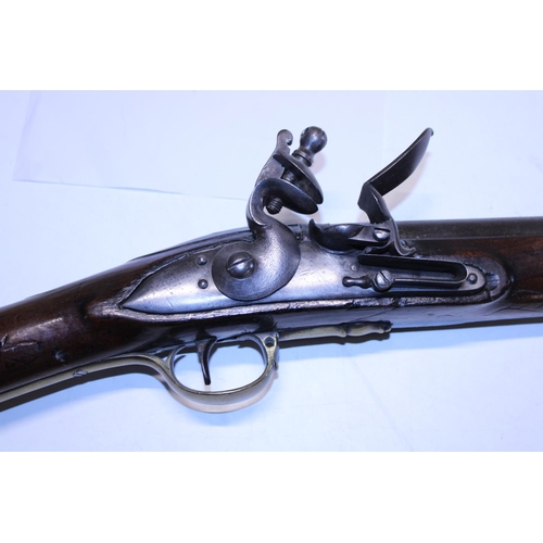 104 - An antique brown Bess flintlock musket with proof marks for Birmingham approx 1850 and earlier with ... 