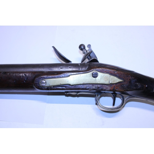 104 - An antique brown Bess flintlock musket with proof marks for Birmingham approx 1850 and earlier with ... 