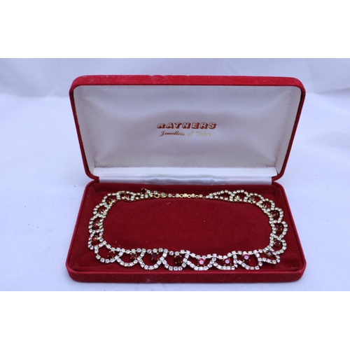 139R - A cased costume jewellery red stone necklace